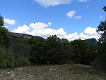 Вид с поляны над Пятым утёсом на вершины Сотера и Караул-кая